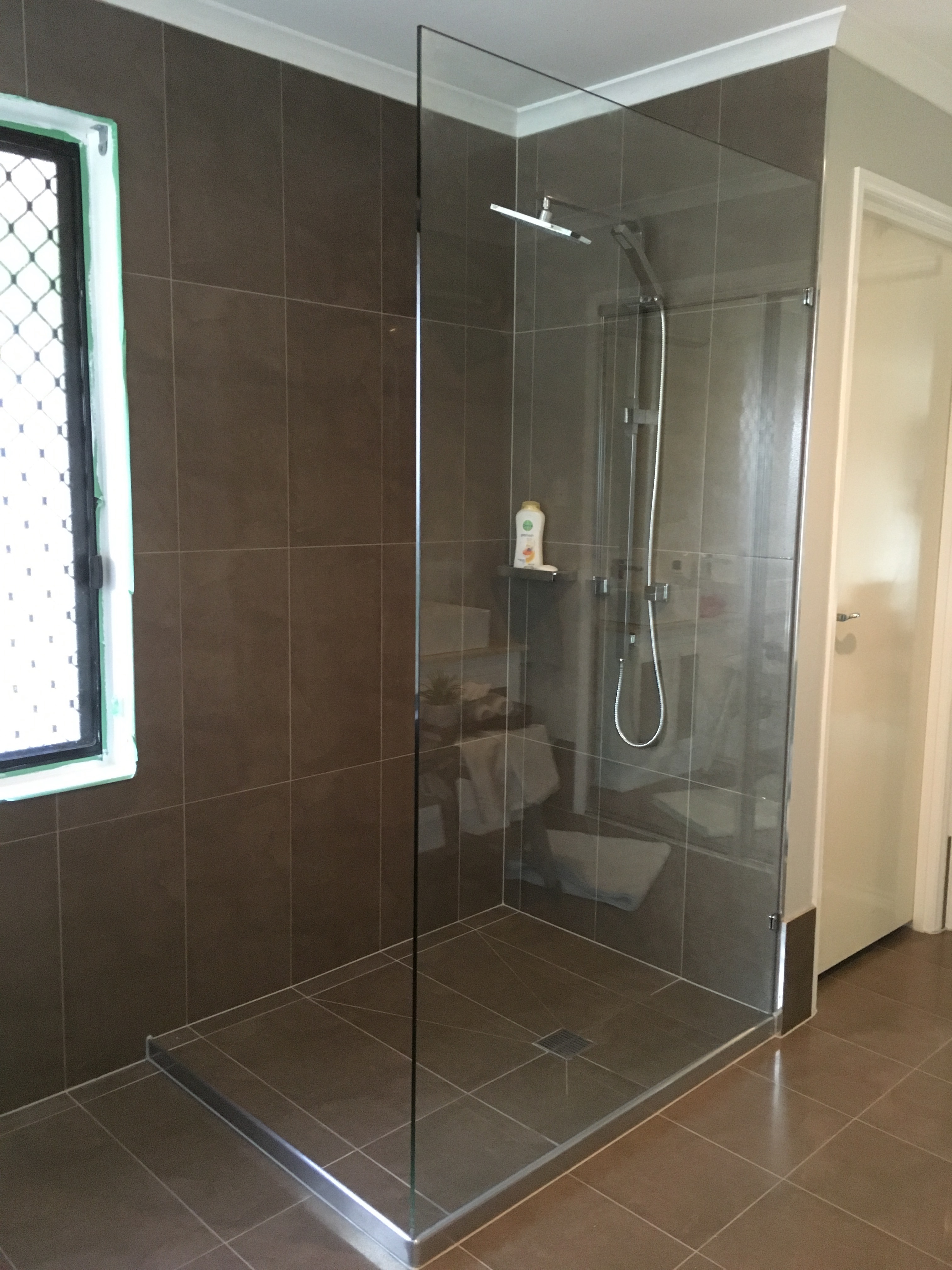 frameless fixed shower screen Greg's Glass & Glazing